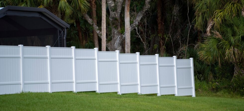Should A Vinyl Fence Touch The Ground?